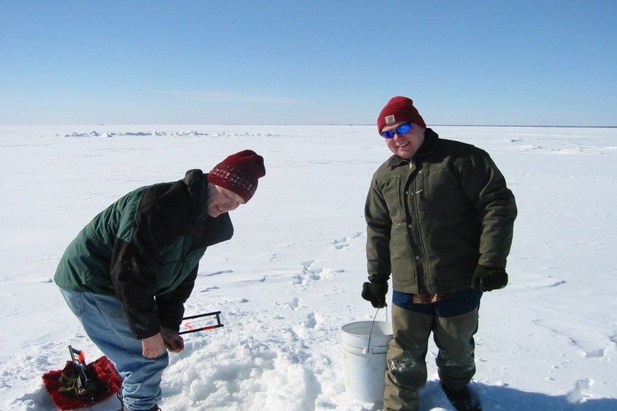 ../image/bill and carl put out tip ups on red lake.jpg